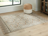 Bay Furniture Gallery - Ashley Furniture - Bachby Rug - 7'10" x 10' Area Rug / Multi - R407681